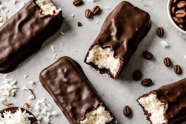 Perfect homemade Mounds bars with glossy dark chocolate coating and coconut centers, a delicious chocolate-coconut treat you can make yourself.