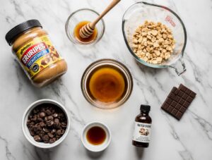 Simple ingredients for no-bake peanut butter balls including peanut butter, honey, and Rice Krispies cereal.